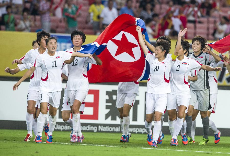 荣耀！朝鲜女足U17夺世界杯冠军，赛后球员举国旗绕场齐跑庆祝